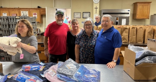Council 1834 Delivers 25 Coats for Kids
